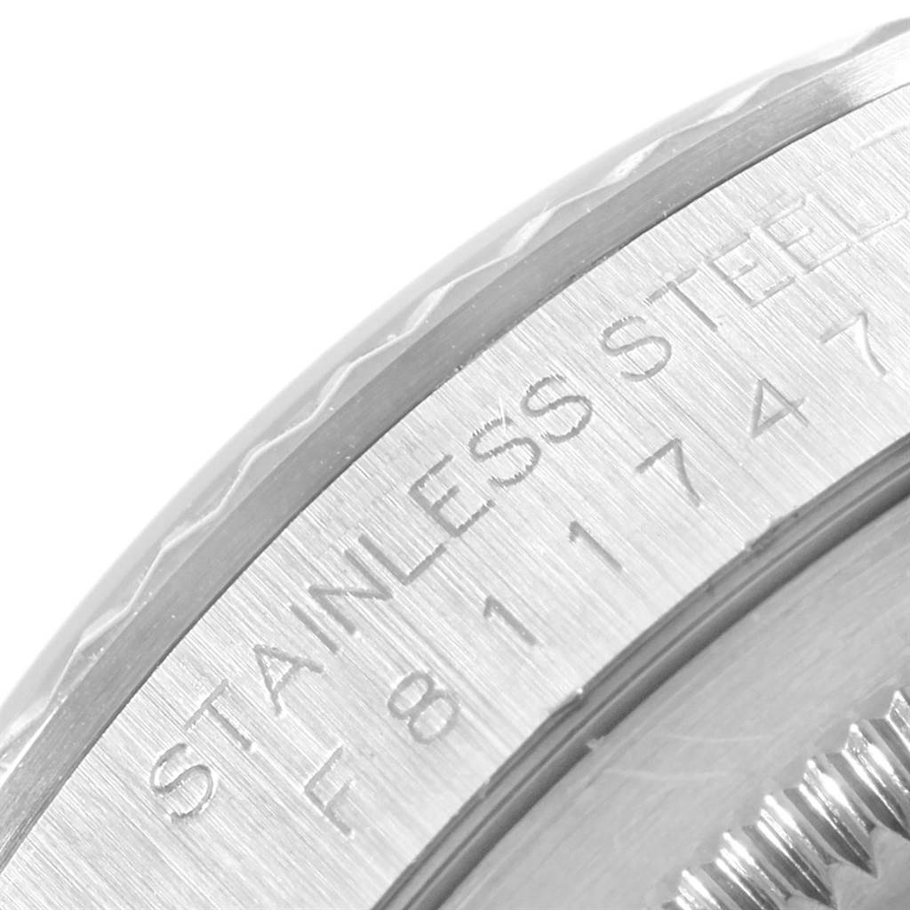 The close-up image shows the stainless steel case back and the serial number engraving of the Rolex Datejust 16234 Men
s Stainless Steel Silver Dial 16234 Men
s Stainless Steel Silver Dial watch.