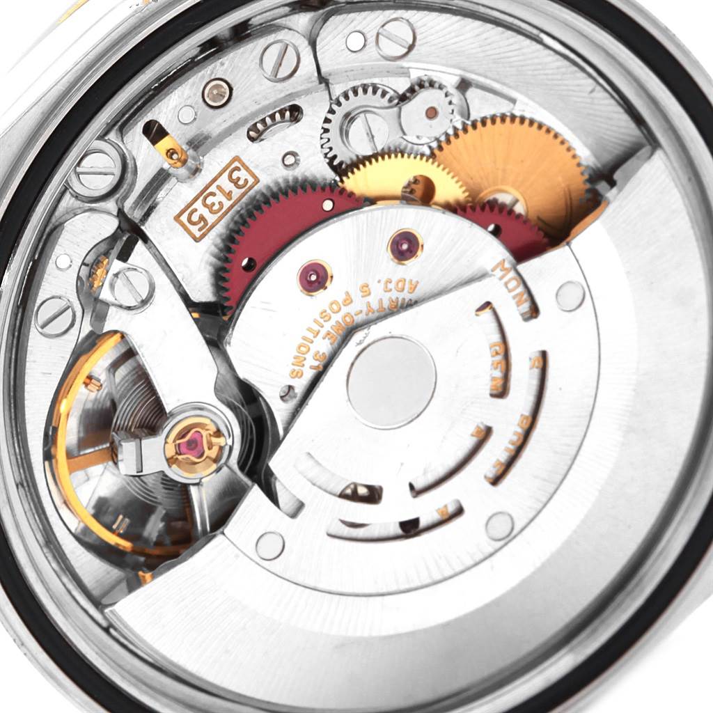 This image shows the intricate inner mechanical movement of a Rolex Datejust 16233 Men
s Steel and Gold (two tone) White Dial 16233 Men
s Steel and Gold (two tone) White Dial watch.
