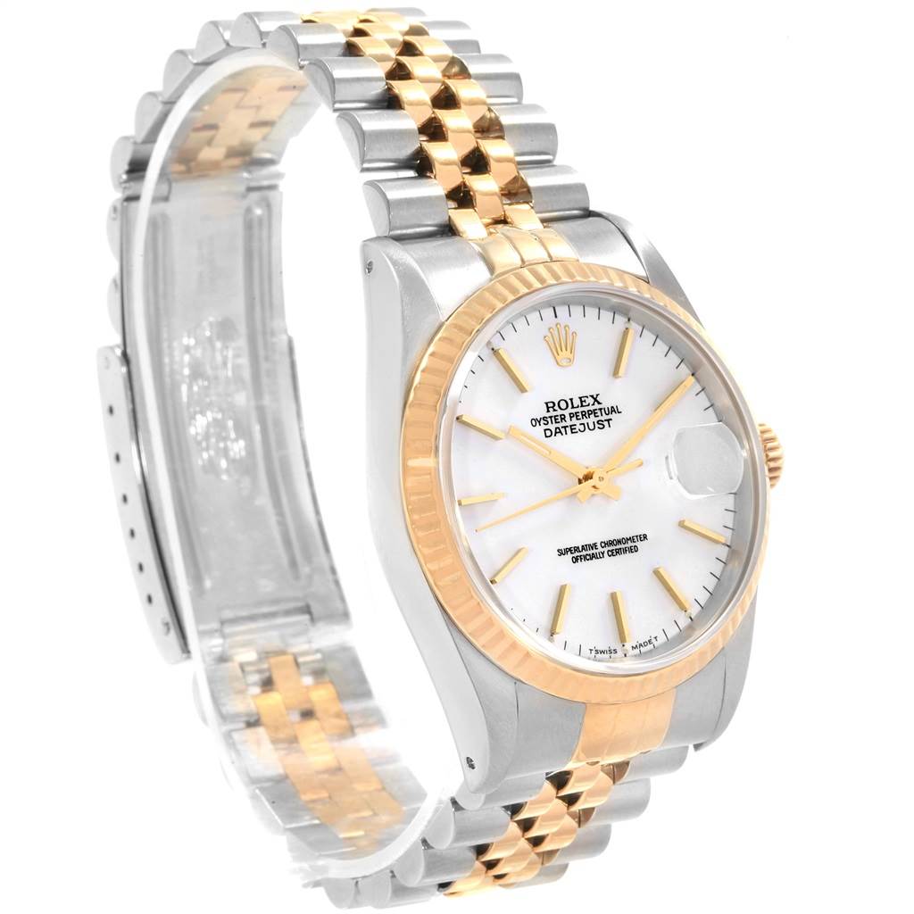 The image shows a Rolex Datejust 16233 Men
s Steel and Gold (two tone) White Dial 16233 Men
s Steel and Gold (two tone) White Dial watch at a three-quarter angle, displaying its two-tone bracelet, white dial, and fluted bezel.