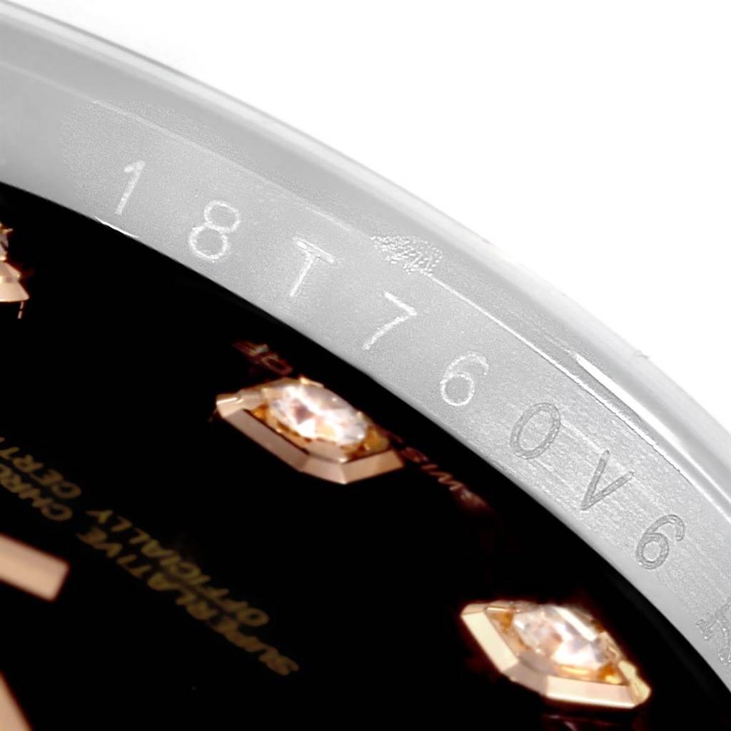 This image shows a close-up of the rehaut and diamond hour markers on the dial of a Rolex Datejust 116201 Men's Steel and Gold (two tone) Black Dial 116201 Men's Steel and Gold (two tone) Black Dial watch.