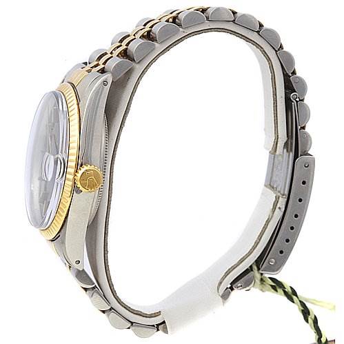 This image shows a side profile view of the Rolex Datejust 16013 Men
s Stainless Steel Black Dial 16013 Men
s Stainless Steel Black Dial watch, highlighting the bezel, crown, and bracelet.