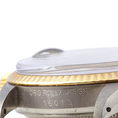 The image shows a side angle of the Rolex Datejust 16013 Men
s Stainless Steel Black Dial 16013 Men
s Stainless Steel Black Dial watch, focusing on the case edge, bezel, and part of the crystal.
