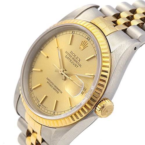 This image shows the Rolex Datejust 16233 Men's Stainless Steel Champagne Dial 16233 Men's Stainless Steel Champagne Dial watch from an angle that highlights its face, bezel, crown, and part of the bracelet.