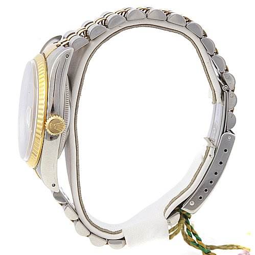 This image shows a side view of the Rolex Datejust 16233 Men's Stainless Steel Champagne Dial 16233 Men's Stainless Steel Champagne Dial watch, highlighting the crown, bezel, and bracelet.