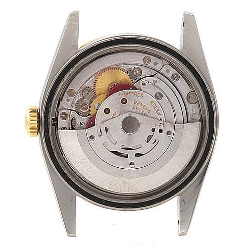 This is the back view of a Rolex Datejust 16233 Men's Stainless Steel Champagne Dial 16233 Men's Stainless Steel Champagne Dial watch, showing its exposed mechanical movement and internal components.