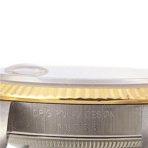 This image shows the case side of a Rolex Datejust 16233 Men's Stainless Steel Champagne Dial 16233 Men's Stainless Steel Champagne Dial watch, featuring the model number 16233 and "ORIG ROLEX DESIGN" engraving.