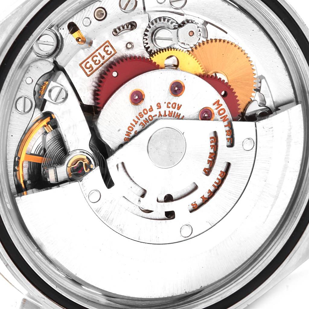 This image shows the internal mechanics of a Rolex Datejust 16233 Men's Steel and Gold (two tone) Black Dial 16233 Men's Steel and Gold (two tone) Black Dial watch, specifically its movement components.