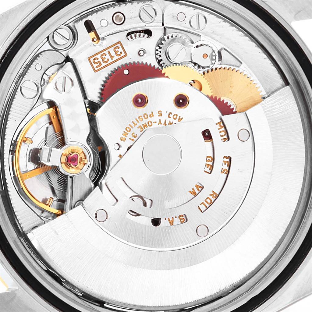 This image shows the internal mechanics and movement of a Rolex Datejust 16233 Men's Steel and Gold (two tone) Grey Dial 16233 Men's Steel and Gold (two tone) Grey Dial watch viewed from the back.