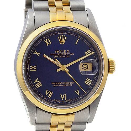 This image shows the face and part of the bracelet of a Rolex Datejust 16203 Men's Stainless Steel Blue Dial 16203 Men's Stainless Steel Blue Dial watch, with a blue dial, gold accents, and Roman numerals.
