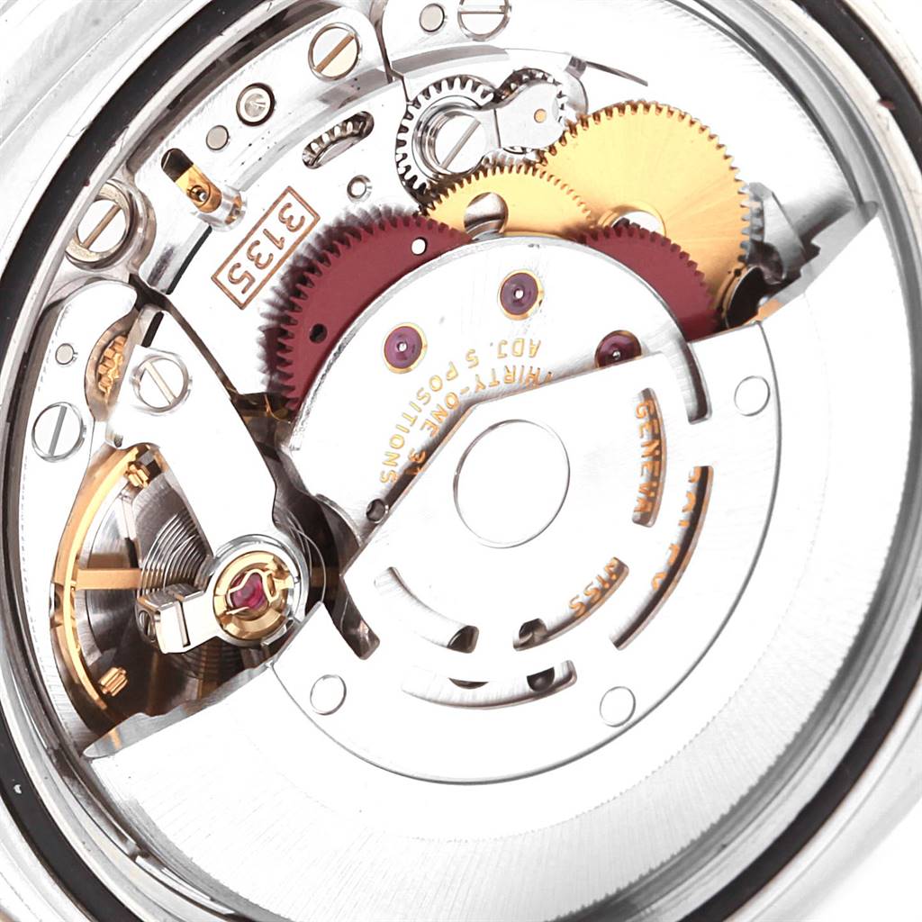 The image shows the internal mechanical movement of a Rolex Datejust 116244 Men
s Stainless Steel Black Dial 116244 Men
s Stainless Steel Black Dial watch, viewed from the back.