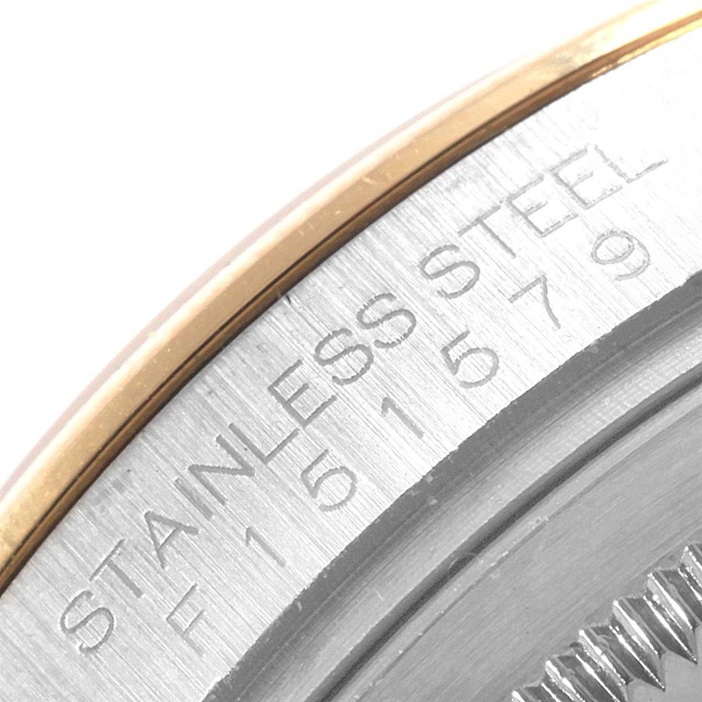This image shows a close-up of the bezel edge and side inscription of a Rolex Datejust 116203 Men's Stainless Steel White Dial 116203 Men's Stainless Steel White Dial watch, highlighting the "STAINLESS STEEL" marking.