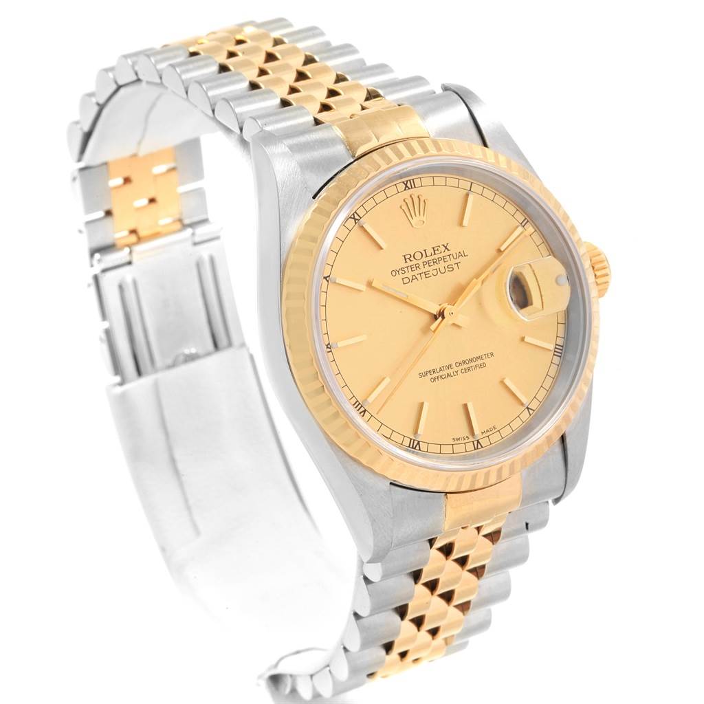 The image shows a Rolex Datejust 16233 Men's Steel and Gold (two tone) Champagne Dial 16233 Men's Steel and Gold (two tone) Champagne Dial watch at an angle highlighting the face, bezel, crown, and part of the two-tone bracelet.