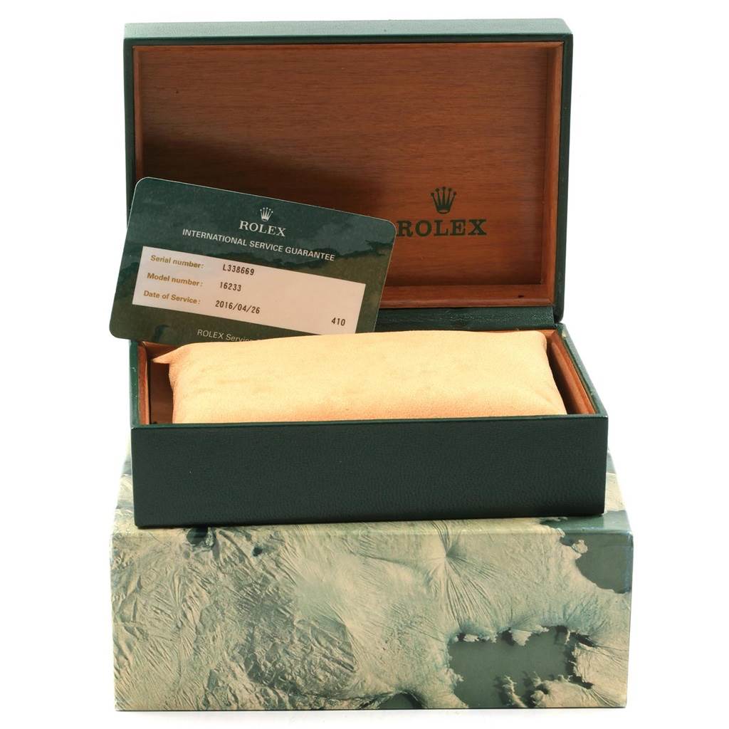 The image shows the open box and a service warranty card for a Rolex Datejust 16233 Men's Steel and Gold (two tone) White Dial 16233 Men's Steel and Gold (two tone) White Dial model.