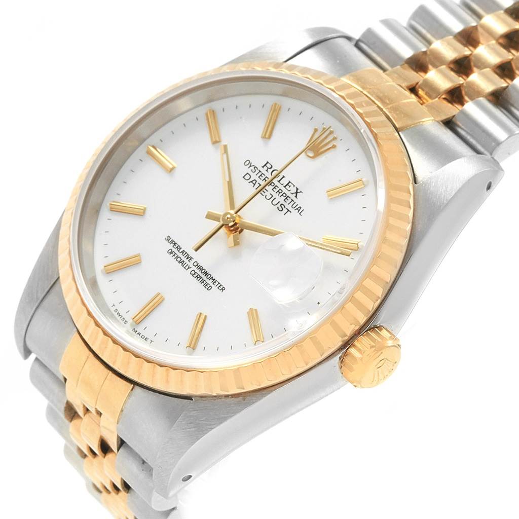 This image shows a Rolex Datejust 16233 Men's Steel and Gold (two tone) White Dial 16233 Men's Steel and Gold (two tone) White Dial watch from an angled perspective, highlighting the dial, bezel, crown, and bracelet.