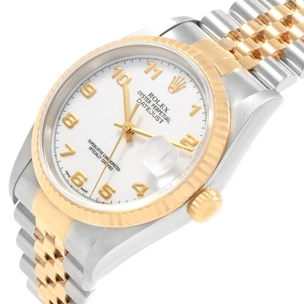 The image shows a Rolex Datejust 16233 Men's Steel and Gold (two tone) White Dial 16233 Men's Steel and Gold (two tone) White Dial model watch taken at a three-quarter angle, highlighting the face, bezel, and Jubilee bracelet.