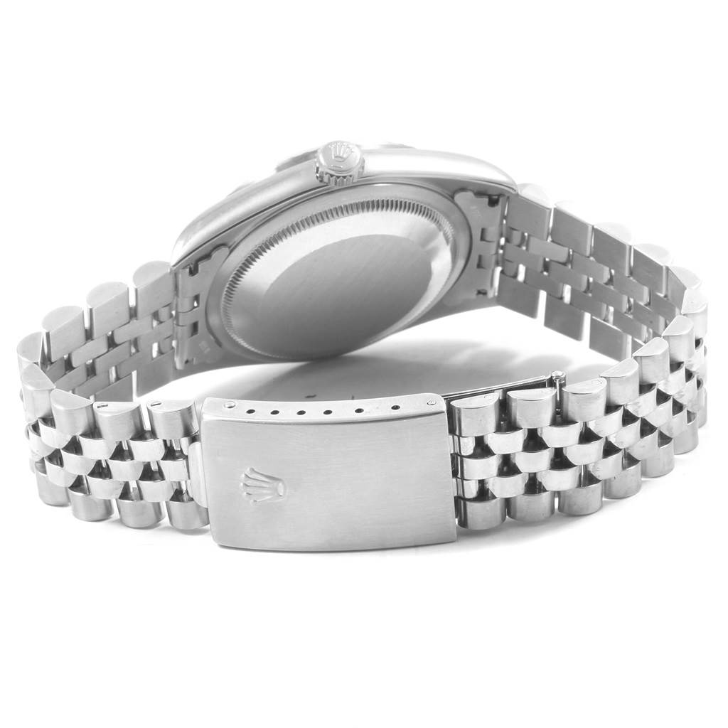 The image shows the back view of a Rolex Datejust 16220 Men
s Stainless Steel Black Dial 16220 Men
s Stainless Steel Black Dial, highlighting the bracelet and clasp.