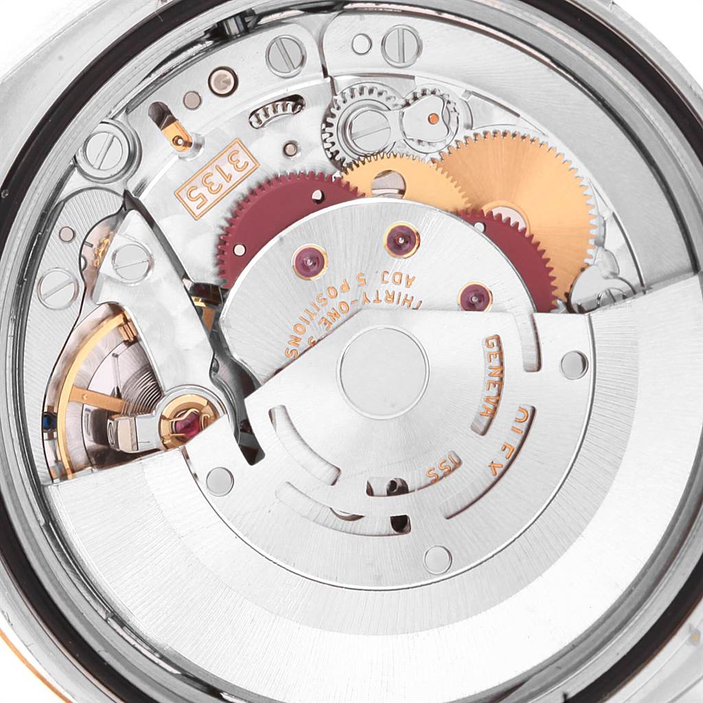 This image shows the internal mechanical movement of a Rolex Datejust 116233 Men's Stainless Steel Black Dial 116233 Men's Stainless Steel Black Dial watch from a close-up angle.