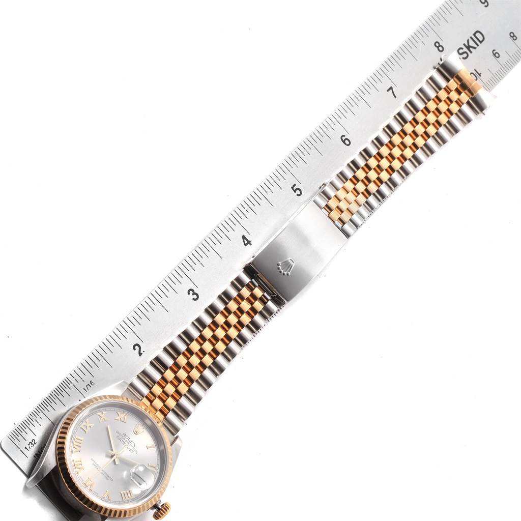 The image shows a Rolex Datejust 16233 Men's Steel and Gold (two tone) Grey Dial 16233 Men's Steel and Gold (two tone) Grey Dial watch band, laid flat and measured with a ruler, along with the watch's face visible at the end.
