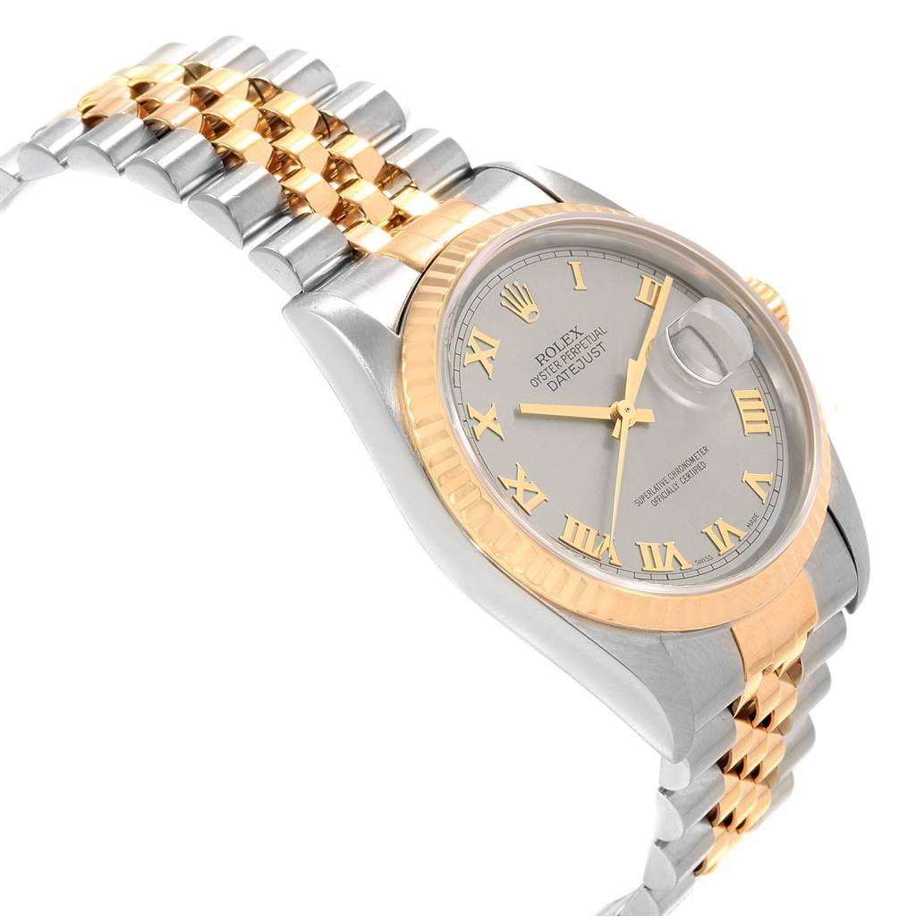 This Rolex Datejust 16233 Men's Steel and Gold (two tone) Grey Dial 16233 Men's Steel and Gold (two tone) Grey Dial watch is seen at an angle highlighting the dial, bezel, and two-tone bracelet.
