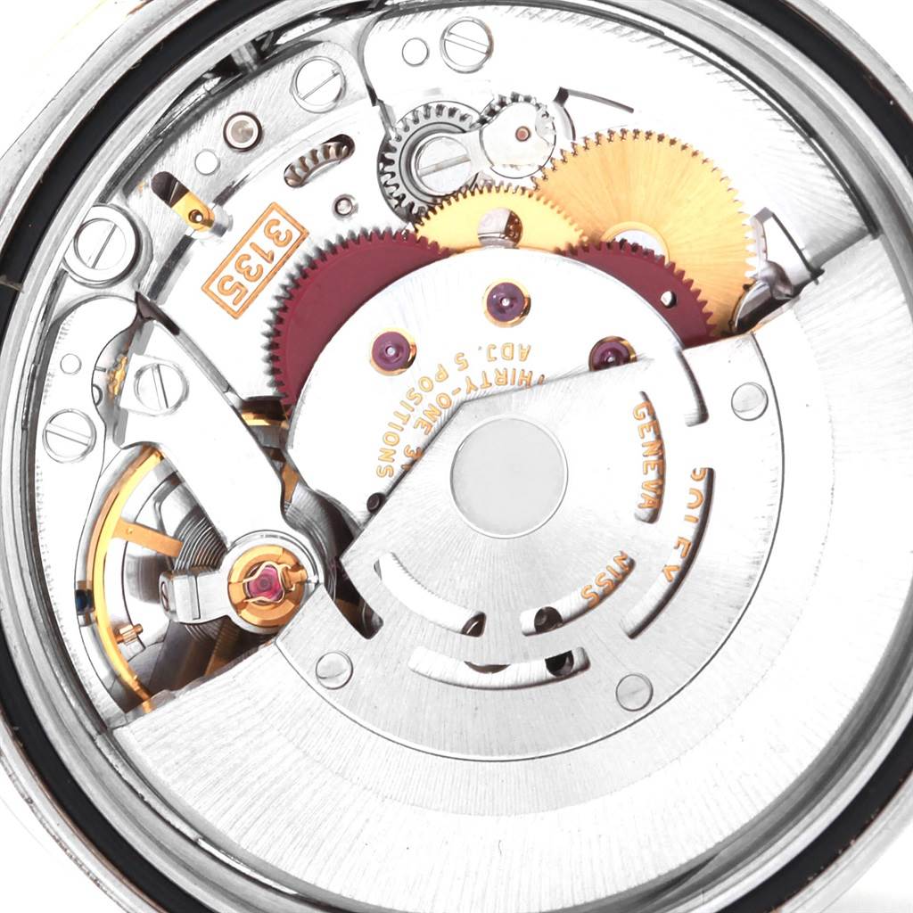 This image shows the internal mechanical movement of the Rolex Datejust 16233 Men's Steel and Gold (two tone) Grey Dial 16233 Men's Steel and Gold (two tone) Grey Dial watch viewed from the back.