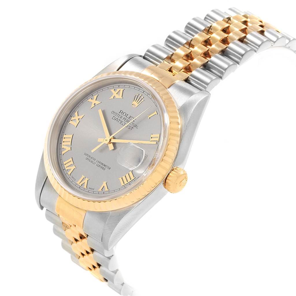 This image shows a Rolex Datejust 16233 Men's Steel and Gold (two tone) Grey Dial 16233 Men's Steel and Gold (two tone) Grey Dial watch viewed from an angle highlighting the face, bezel, and two-tone bracelet.