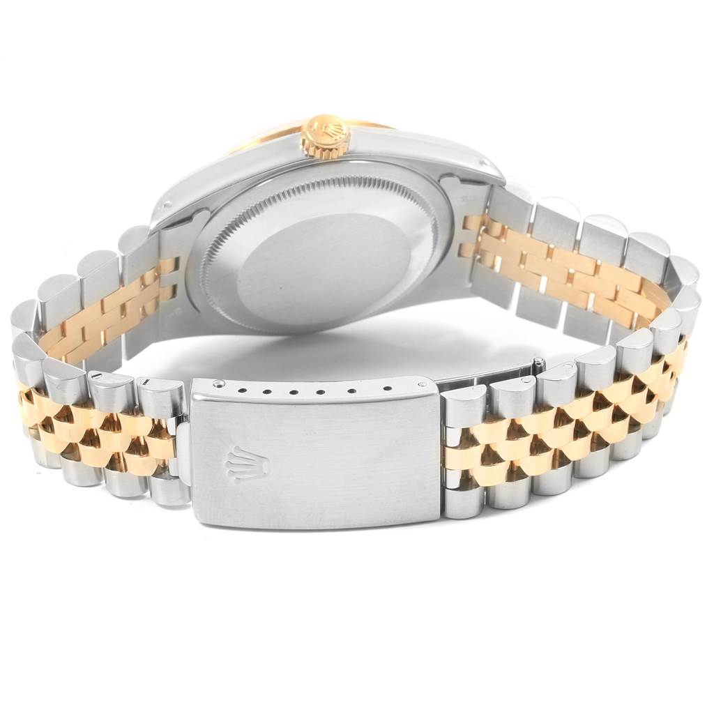 The image shows the case back, crown, and bracelet clasp of a Rolex Datejust 16233 Men's Steel and Gold (two tone) Champagne Dial 16233 Men's Steel and Gold (two tone) Champagne Dial watch from a rear angle.