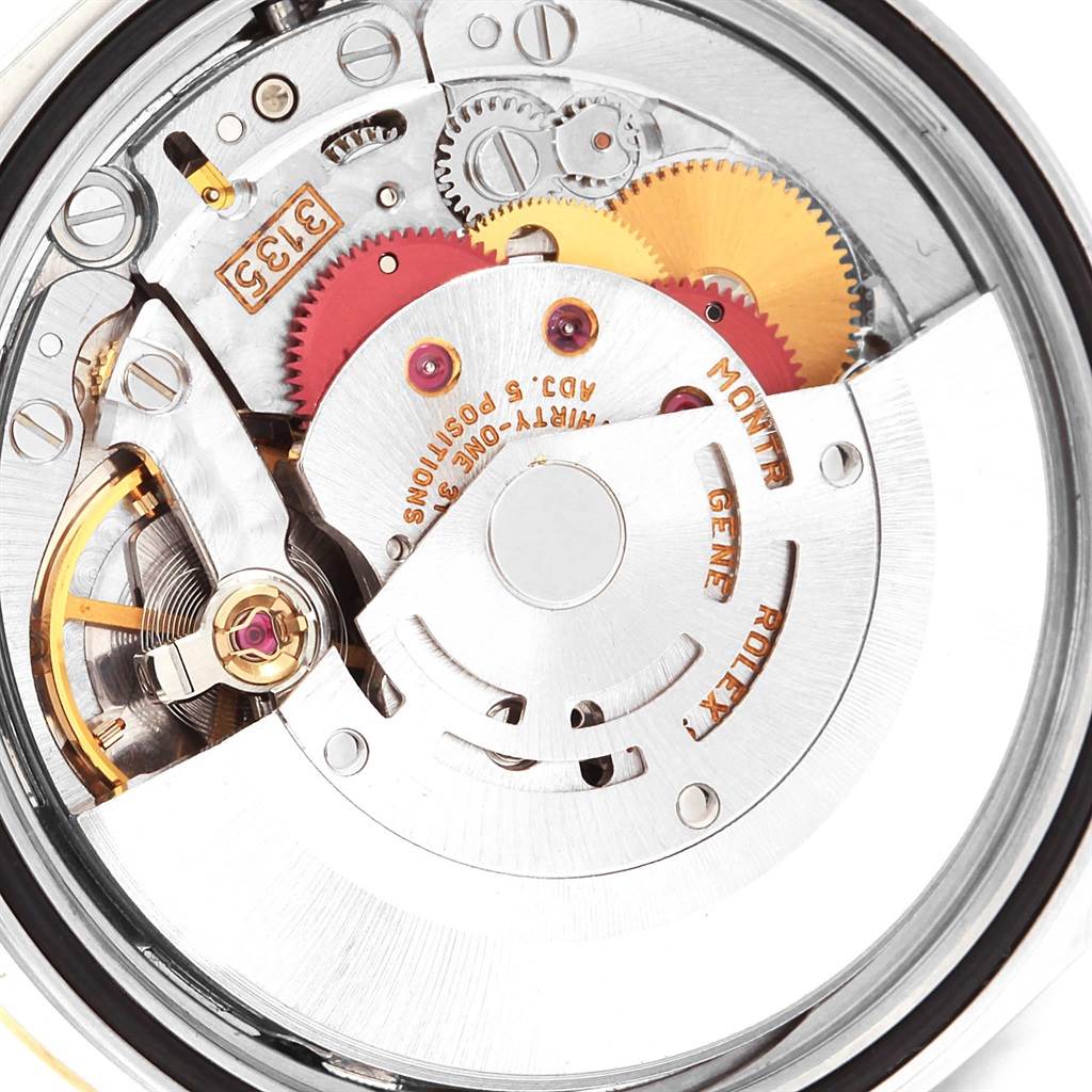 The image shows the back view of the movement mechanism inside a Rolex Datejust 16233 Men's Steel and Gold (two tone) Champagne Dial 16233 Men's Steel and Gold (two tone) Champagne Dial model watch.