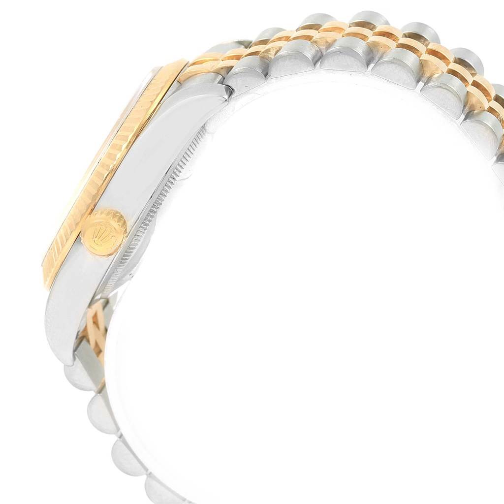 The image shows the side view of a Rolex Datejust 116233 Men's Stainless Steel Silver Dial 116233 Men's Stainless Steel Silver Dial watch, highlighting its crown and part of the jubilee bracelet.