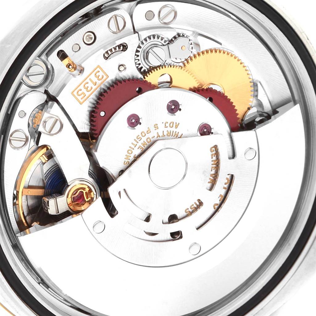 This image shows the internal mechanical movement of a Rolex Datejust 116233 Men's Stainless Steel Silver Dial 116233 Men's Stainless Steel Silver Dial watch at a close-up angle.