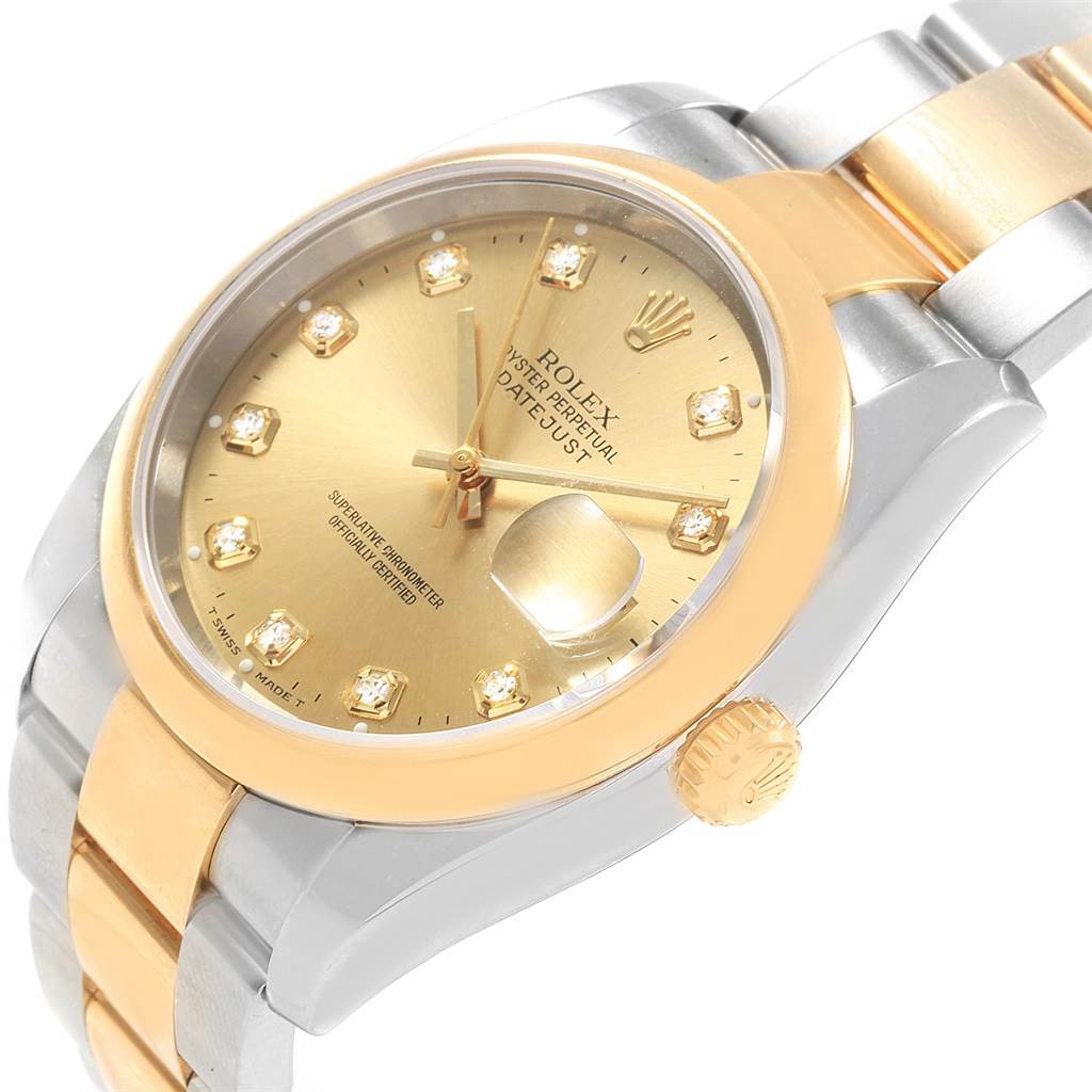 This image shows a Rolex Datejust 116203 Men's Stainless Steel Champagne Dial 116203 Men's Stainless Steel Champagne Dial watch at an angle, highlighting the dial, crown, and part of the bracelet.