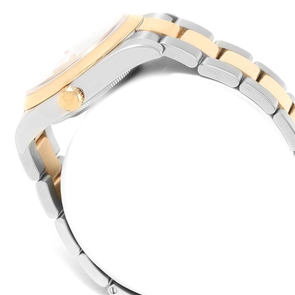 The image shows the side view of a Rolex Datejust 116203 Men's Stainless Steel Champagne Dial 116203 Men's Stainless Steel Champagne Dial watch, highlighting the crown, case, and two-tone bracelet.