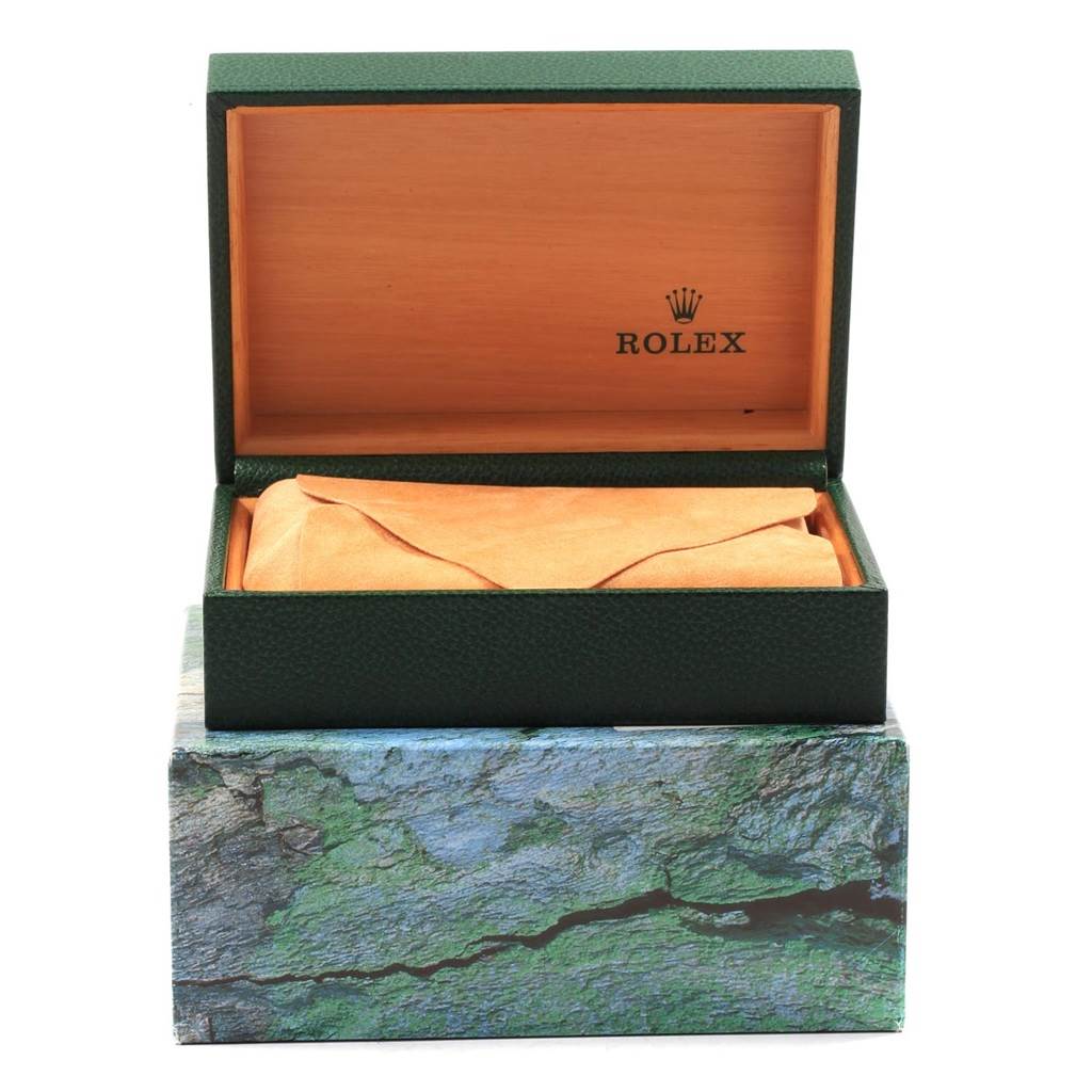 The image is of an open box for a Rolex Datejust 16233 Men's Steel and Gold (two tone) Champagne Dial 16233 Men's Steel and Gold (two tone) Champagne Dial watch, with the inner cushion visible and the Rolex logo on the wooden interior.