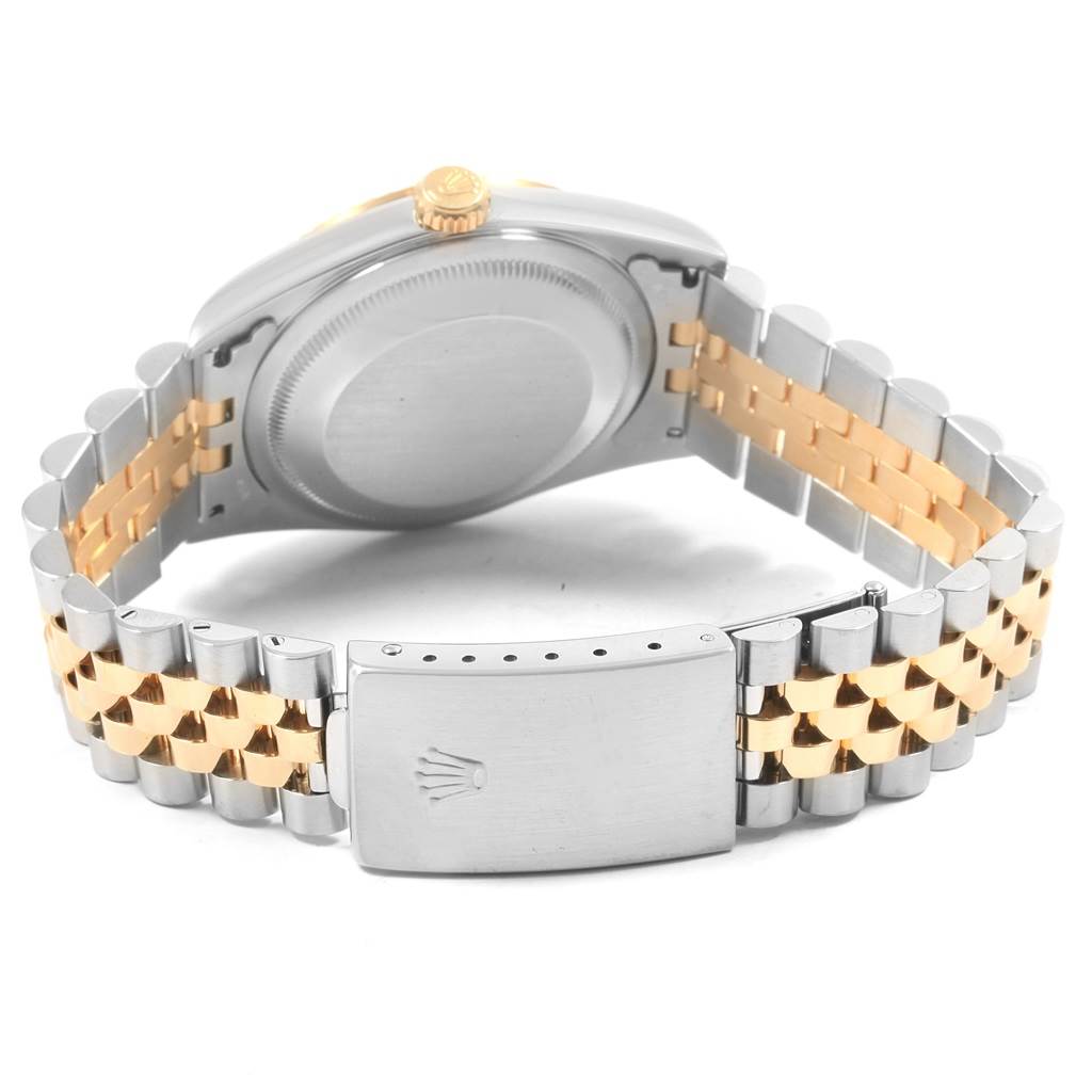 The image shows the back case and Jubilee bracelet of a Rolex Datejust 16233 Men's Steel and Gold (two tone) Champagne Dial 16233 Men's Steel and Gold (two tone) Champagne Dial watch, highlighting the clasp with the Rolex logo.