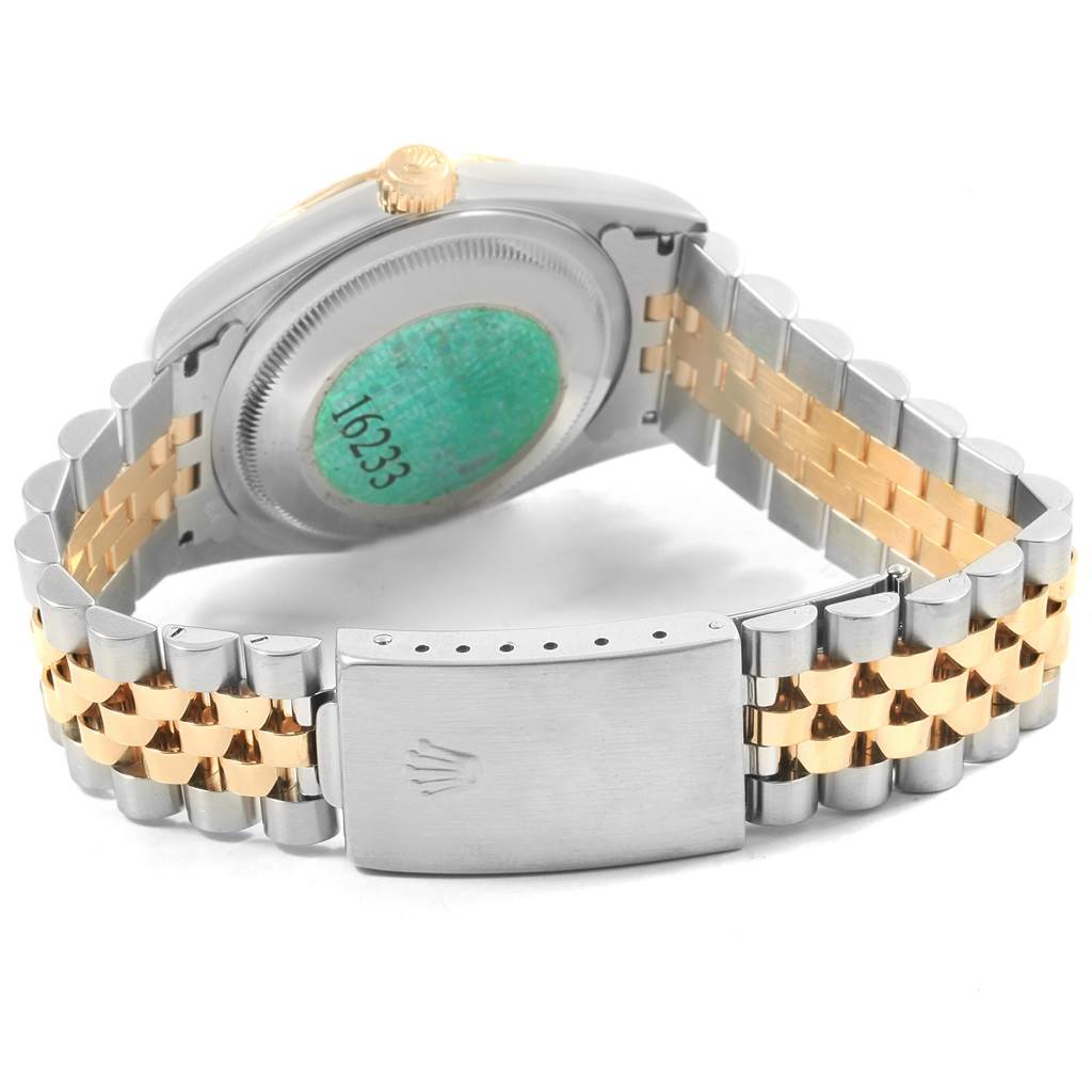 The image shows the backside and the bracelet of a Rolex Datejust 16233 Men's Steel and Gold (two tone) White Dial 16233 Men's Steel and Gold (two tone) White Dial watch, highlighting the clasp and case back.