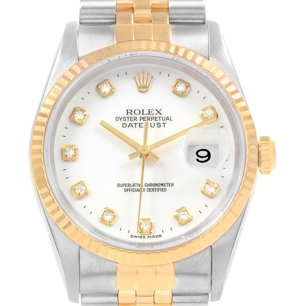 Front view of the Rolex Datejust 16233 Men's Steel and Gold (two tone) White Dial 16233 Men's Steel and Gold (two tone) White Dial watch showing the dial, hands, date window, and part of the bracelet.