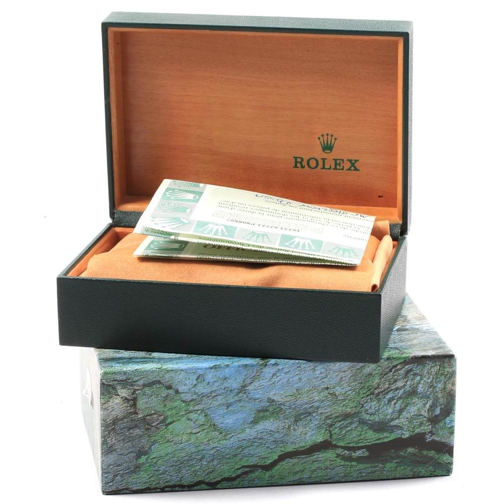 The image shows the open box of a Rolex Datejust 16233 Men's Steel and Gold (two tone) White Dial 16233 Men's Steel and Gold (two tone) White Dial watch along with its documents.