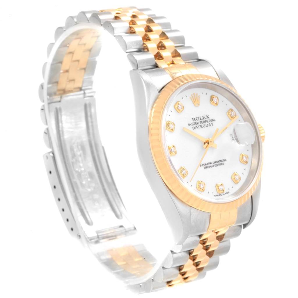 This image showcases the Rolex Datejust 16233 Men's Steel and Gold (two tone) White Dial 16233 Men's Steel and Gold (two tone) White Dial watch from a front diagonal angle, highlighting its face, bezel, and a portion of the band.