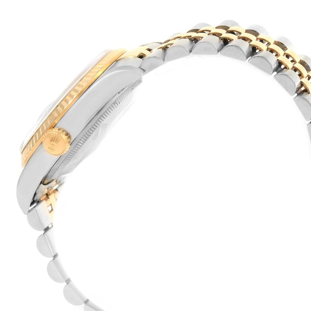 This side view shows the gold and silver crown, case, and two-tone bracelet of the Rolex Datejust 16233 Men's Steel and Gold (two tone) White Dial 16233 Men's Steel and Gold (two tone) White Dial model.