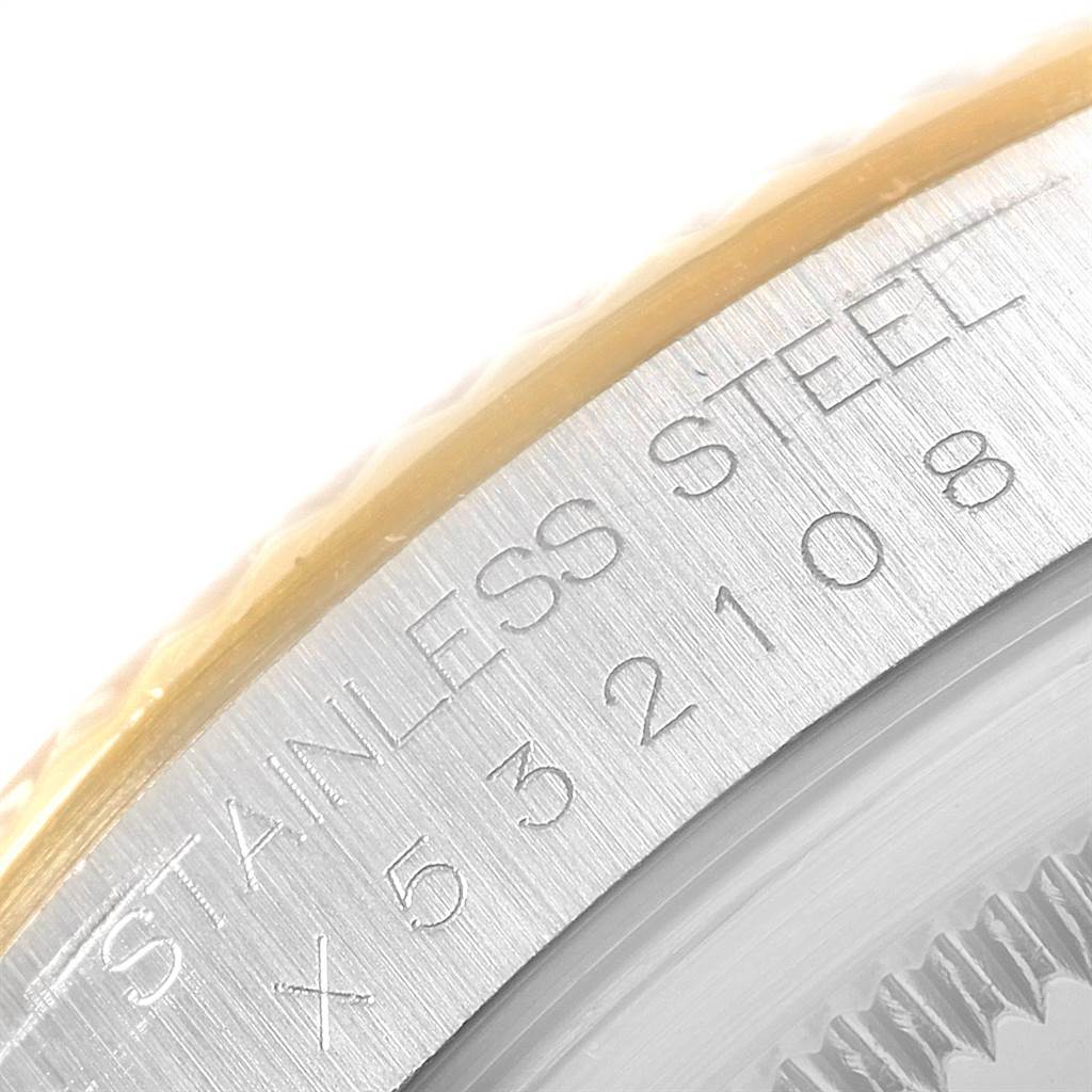 The image shows a close-up of the stainless steel and gold bezel with engraved serial numbers on a Rolex Datejust 16233 Men's Steel and Gold (two tone) White Dial 16233 Men's Steel and Gold (two tone) White Dial watch.