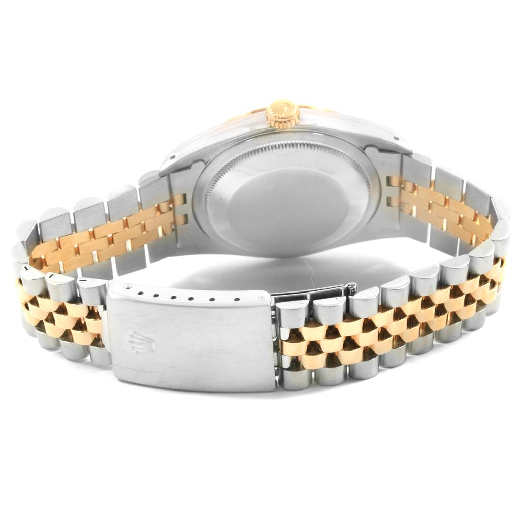 The image shows the back case and two-tone jubilee bracelet of a Rolex Datejust 16233 Men's Steel and Gold (two tone) Champagne Dial 16233 Men's Steel and Gold (two tone) Champagne Dial watch, taken from a rear angle.