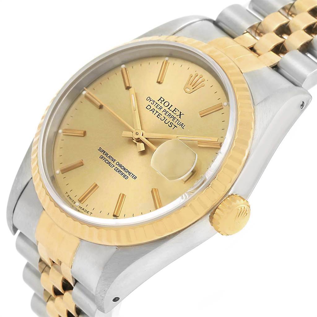 This image shows a close-up of a Rolex Datejust 16233 Men's Steel and Gold (two tone) Champagne Dial 16233 Men's Steel and Gold (two tone) Champagne Dial watch at a slight angle, highlighting the face, bezel, crown, and part of the bracelet.