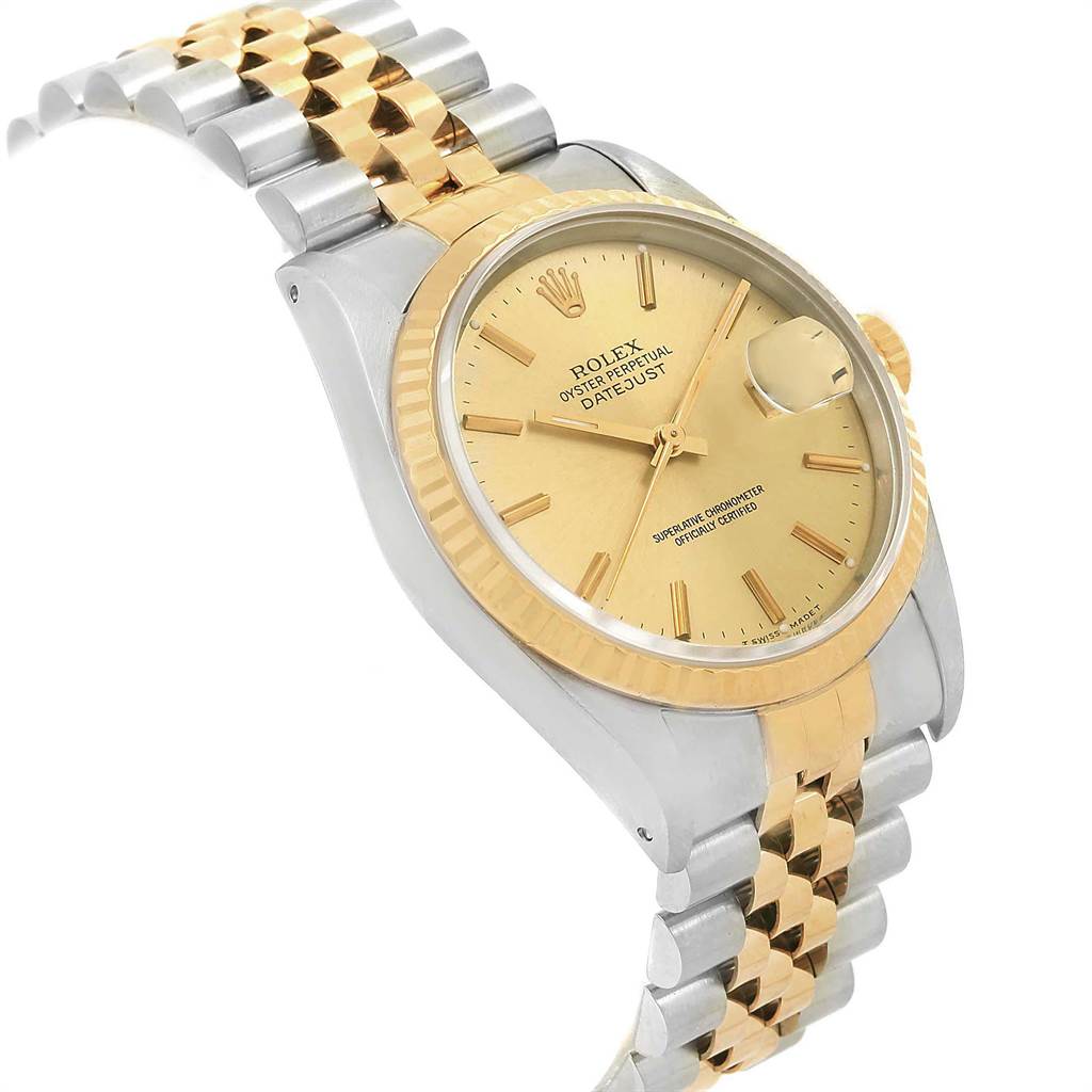 The image shows a Rolex Datejust 16233 Men's Steel and Gold (two tone) Champagne Dial 16233 Men's Steel and Gold (two tone) Champagne Dial watch at an angle highlighting its gold dial, gold bezel, and two-tone Jubilee bracelet.