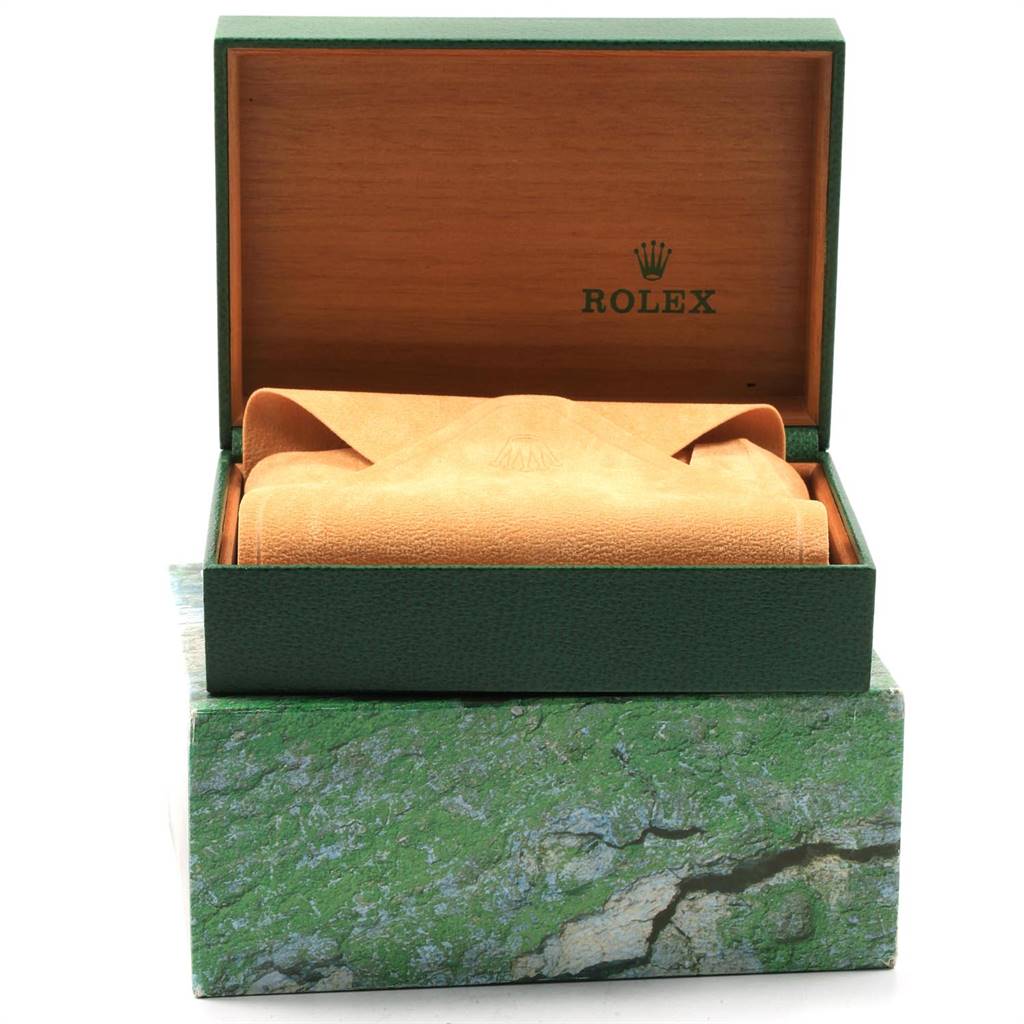 The image shows a Rolex Datejust 16233 Men's Steel and Gold (two tone) Blue Dial 16233 Men's Steel and Gold (two tone) Blue Dial watch box, with the watch wrapped in a protective cloth inside, viewed from the front.