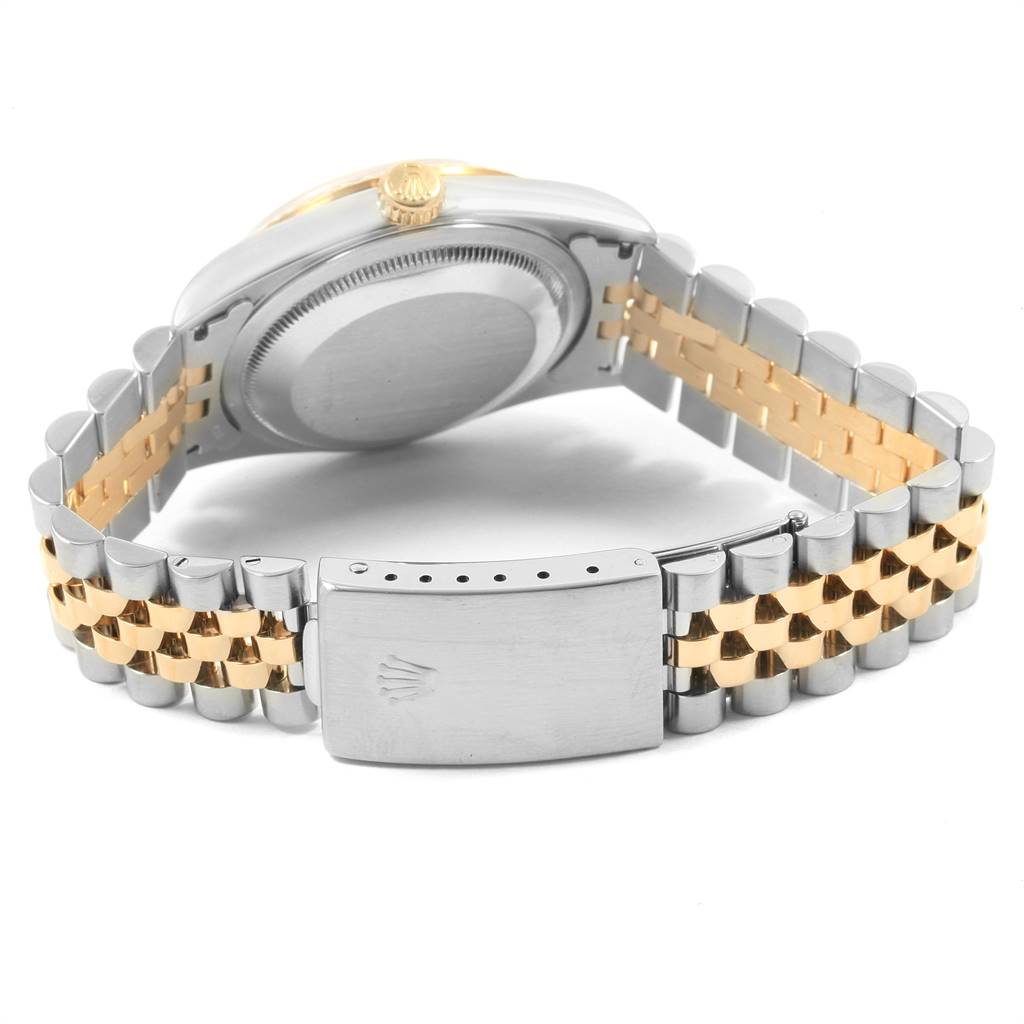 This Rolex Datejust 16233 Men's Steel and Gold (two tone) Blue Dial 16233 Men's Steel and Gold (two tone) Blue Dial watch is shown from the back, focusing on the clasp and bracelet.