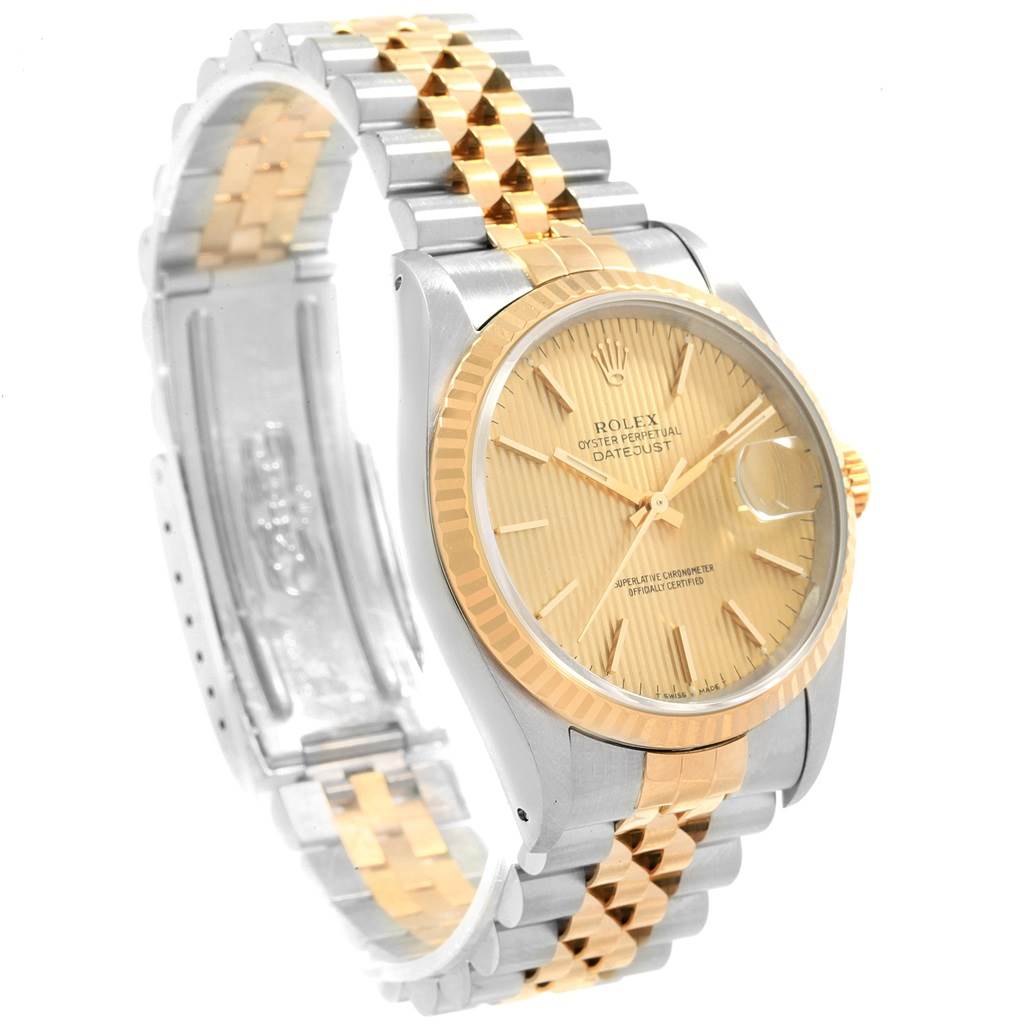 This image shows a Rolex Datejust 16233 Men's Steel and Gold (two tone) Champagne Dial 16233 Men's Steel and Gold (two tone) Champagne Dial watch featuring its dial, case, and two-tone metal bracelet at a three-quarter angle.