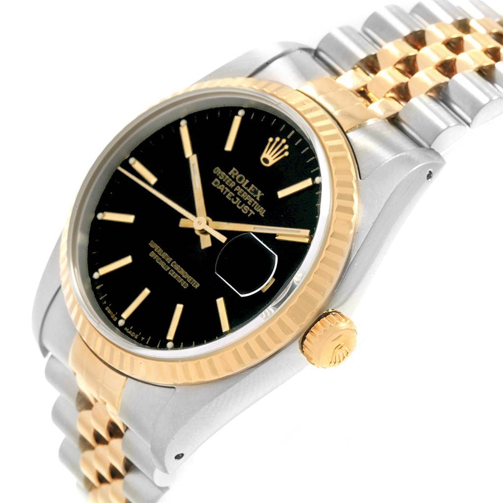 This image shows a side-angle view of the Rolex Datejust 16233 Men's Steel and Gold (two tone) Black Dial 16233 Men's Steel and Gold (two tone) Black Dial watch, highlighting the dial, bezel, crown, and two-tone bracelet.