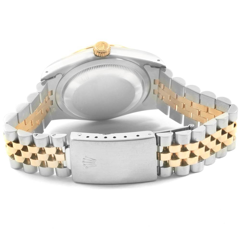 The image shows the backside and strap of a Rolex Datejust 16233 Men's Steel and Gold (two tone) Black Dial 16233 Men's Steel and Gold (two tone) Black Dial watch, highlighting the two-tone Jubilee bracelet and clasp.
