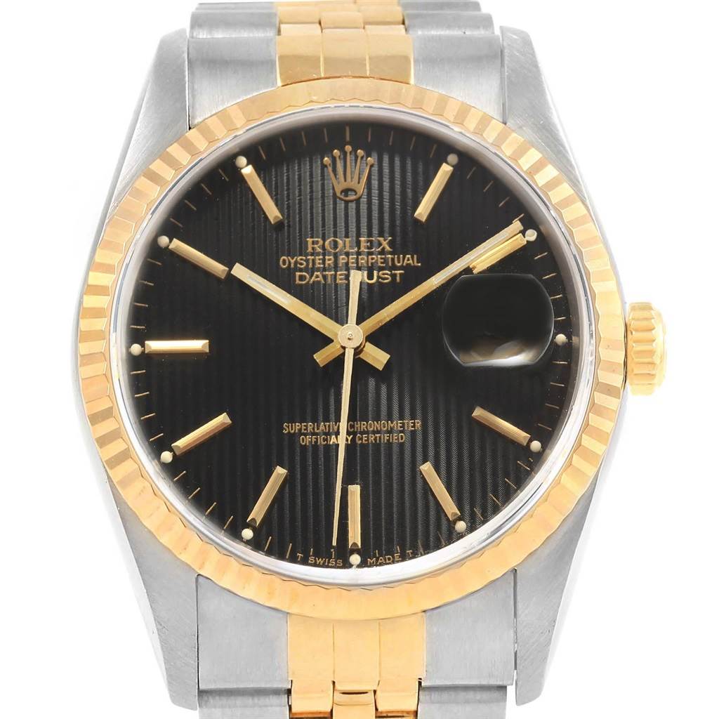 This image shows a Rolex Datejust 16233 Men's Steel and Gold (two tone) Black Dial 16233 Men's Steel and Gold (two tone) Black Dial watch from a front angle, highlighting the face, bezel, and bracelet.