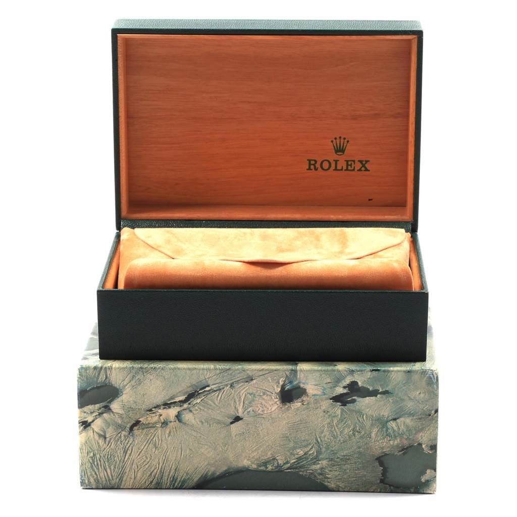 This image shows an open Rolex Datejust 16233 Men's Steel and Gold (two tone) Black Dial 16233 Men's Steel and Gold (two tone) Black Dial model watch box with its interior and outer case visible.
