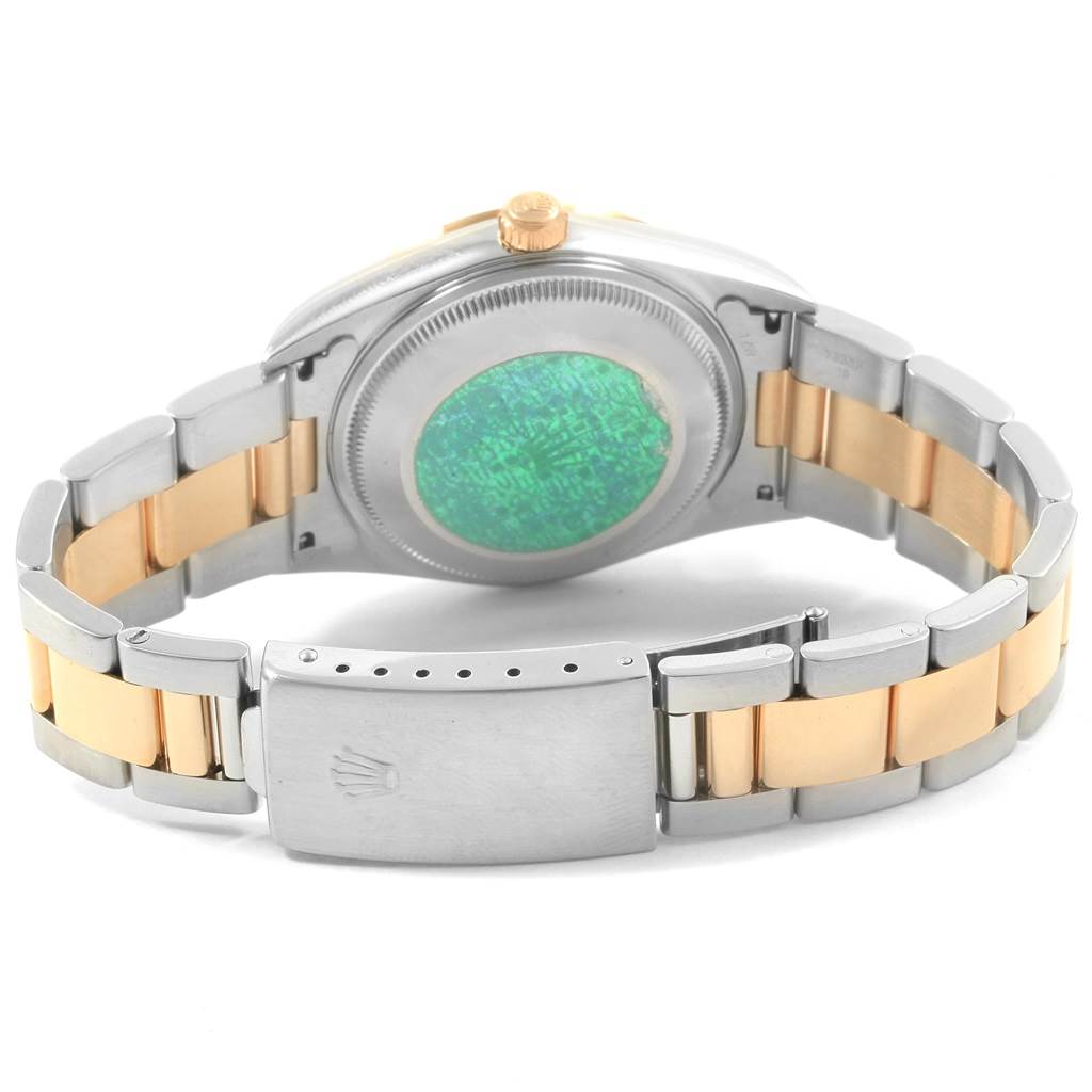 This image shows the back of a Rolex Datejust 15203 Men's Steel and Gold (two tone) White Dial 15203 Men's Steel and Gold (two tone) White Dial model, highlighting the case back and two-tone bracelet with clasp.